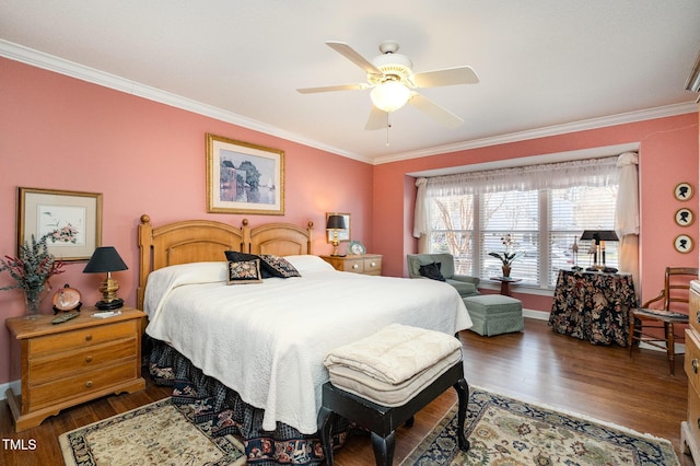 bedroom featuring ornamental molding, baseboards, ceiling fan, and wood finished floors