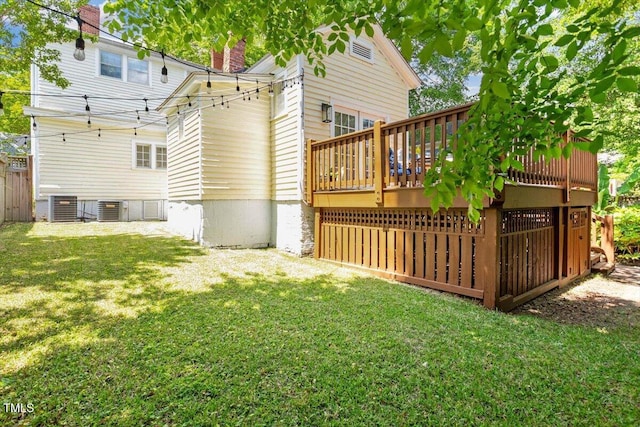 216 N Bloodworth St, Raleigh, NC 27601 - rear view of property with a lawn, a wooden deck, central AC, and a chimney