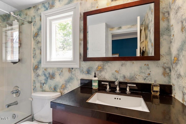 216 N Bloodworth St, Raleigh, NC 27601 - full bath featuring vanity, shower / tub combination, toilet, and wallpapered walls