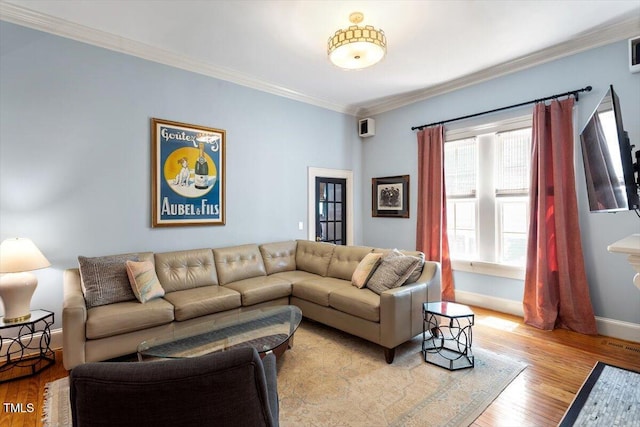 216 N Bloodworth St, Raleigh, NC 27601 - living room featuring crown molding, light wood-style flooring, baseboards, and visible vents