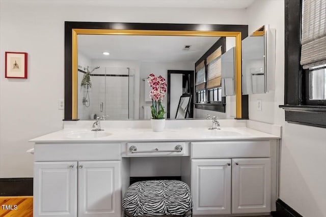 216 N Bloodworth St, Raleigh, NC 27601 - full bath featuring double vanity, a sink, visible vents, and a shower stall