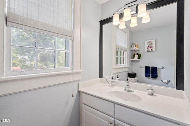 216 N Bloodworth St, Raleigh, NC 27601 - bathroom with vanity and a chandelier