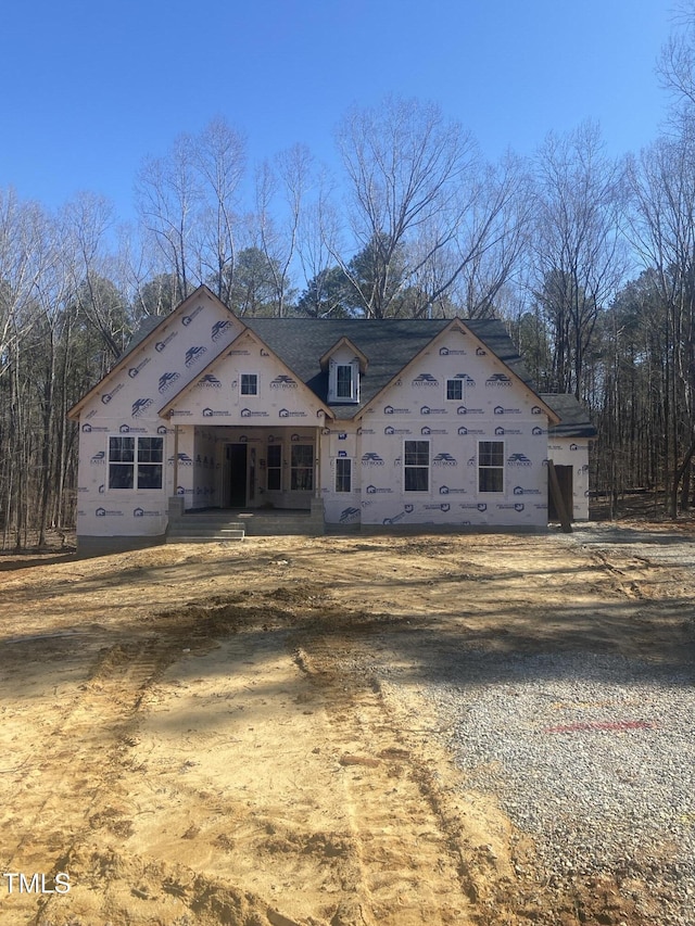 property under construction with covered porch