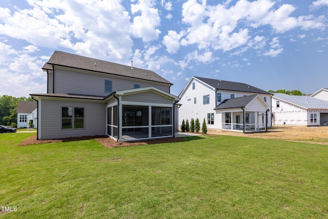 3521 Amelia Grace Dr Lot 67, Fuquay Varina, NC 27526 - back of property featuring a sunroom and a lawn