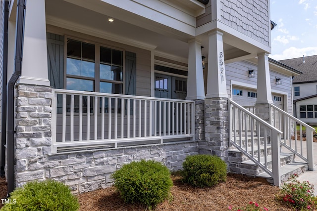 3521 Amelia Grace Dr Lot 67, Fuquay Varina, NC 27526 - view of property exterior with a porch and stone siding