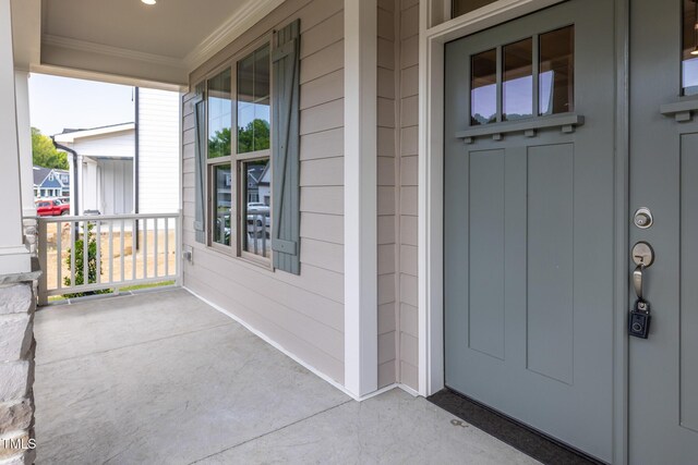 3521 Amelia Grace Dr Lot 67, Fuquay Varina, NC 27526 - doorway to property with a porch