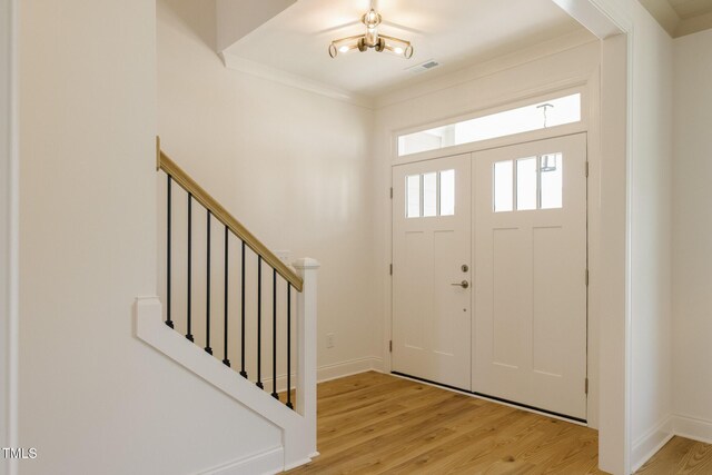 3521 Amelia Grace Dr Lot 67, Fuquay Varina, NC 27526 - foyer entrance with light wood finished floors, stairs, and baseboards