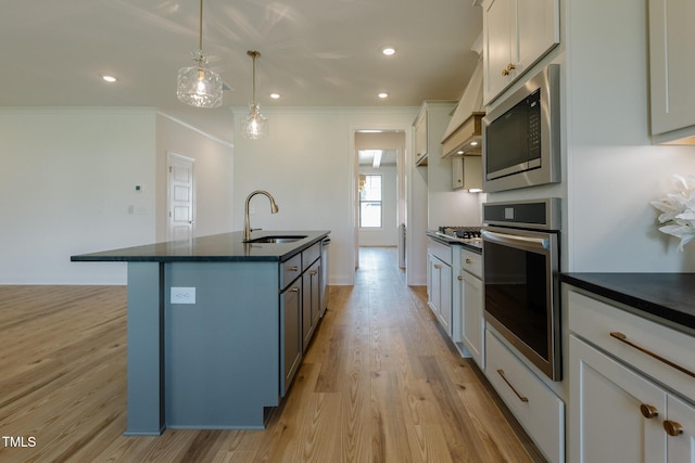 3521 Amelia Grace Dr Lot 67, Fuquay Varina, NC 27526 - kitchen with oven, built in microwave, a sink, dark countertops, and ornamental molding