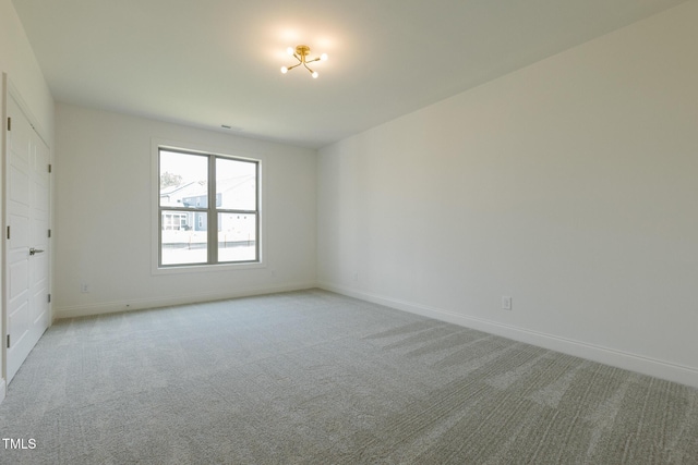 3521 Amelia Grace Dr Lot 67, Fuquay Varina, NC 27526 - unfurnished room featuring baseboards and light colored carpet