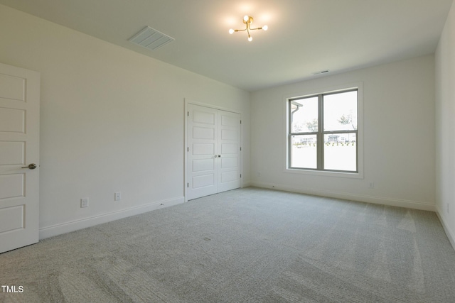 3521 Amelia Grace Dr Lot 67, Fuquay Varina, NC 27526 - unfurnished bedroom with carpet, baseboards, and a closet