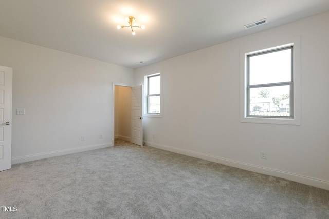 3521 Amelia Grace Dr Lot 67, Fuquay Varina, NC 27526 - empty room with baseboards and light carpet