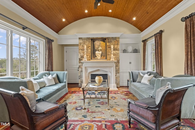 living area with a wealth of natural light, recessed lighting, and vaulted ceiling