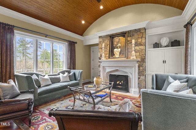 living room featuring built in shelves, a fireplace with flush hearth, lofted ceiling, recessed lighting, and baseboards