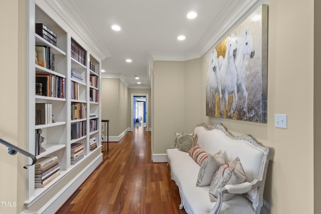 hallway with recessed lighting, baseboards, wood finished floors, and ornamental molding