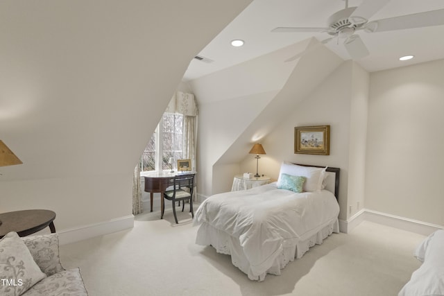 carpeted bedroom featuring visible vents, baseboards, ceiling fan, and vaulted ceiling