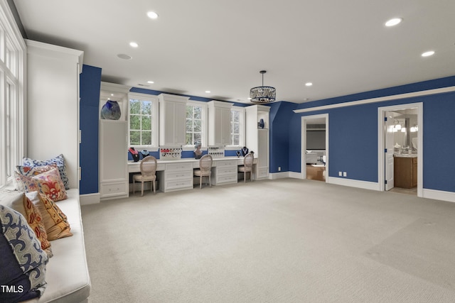 interior space featuring recessed lighting, light colored carpet, and baseboards