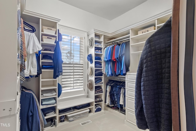 spacious closet featuring visible vents