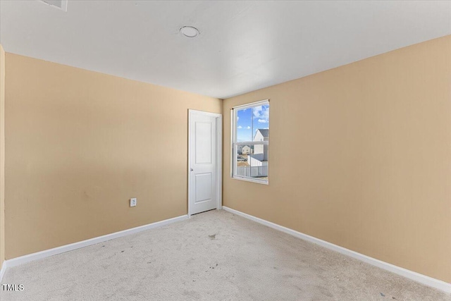 1004 Bridgewater Dr, Durham, NC 27704 - empty room with light colored carpet