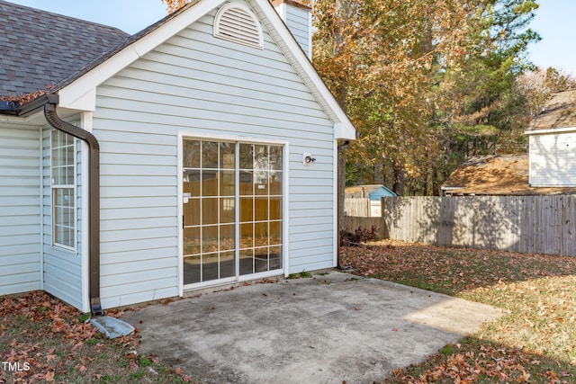 view of outdoor structure featuring fence