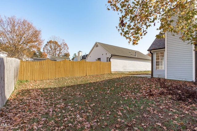 view of yard featuring a fenced backyard