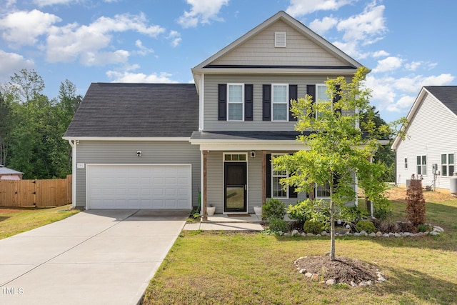 traditional home with driveway and a garage