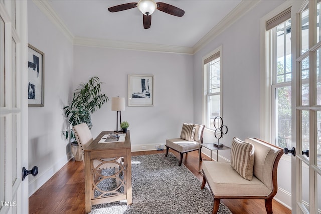 office area featuring a ceiling fan, crown molding, baseboards, and dark wood-style flooring