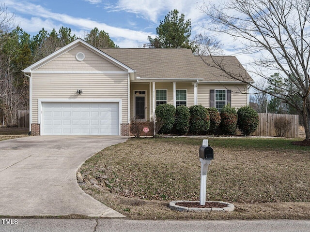 single story home with driveway, brick siding, an attached garage, and fence