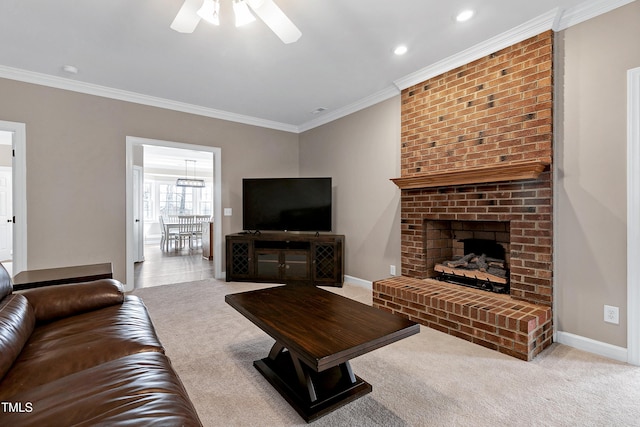 carpeted living area featuring a brick fireplace, crown molding, and baseboards