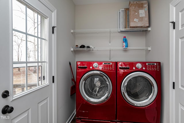 laundry area with laundry area and separate washer and dryer