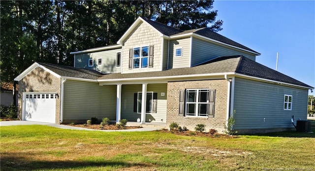 view of front of property featuring a front lawn, central AC unit, a garage, and a porch