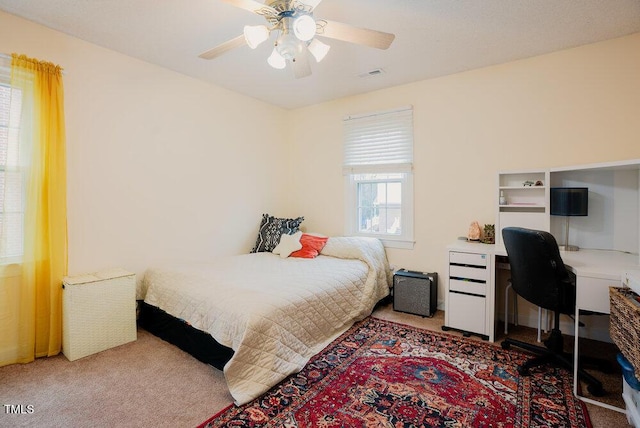 bedroom with carpet flooring and a ceiling fan