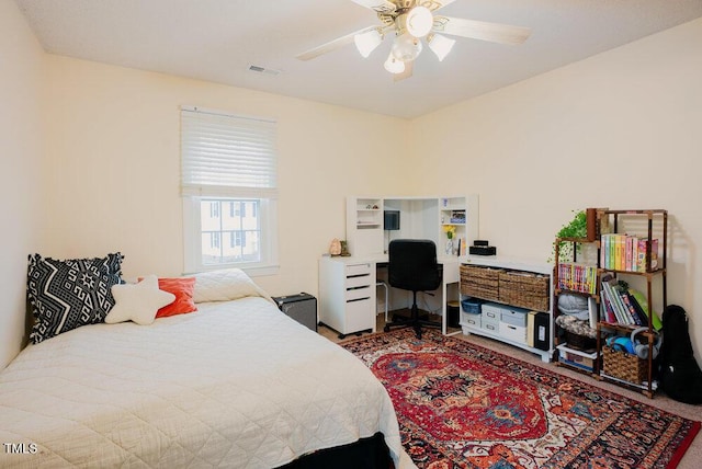 bedroom with visible vents and a ceiling fan