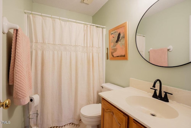 full bath featuring vanity and toilet