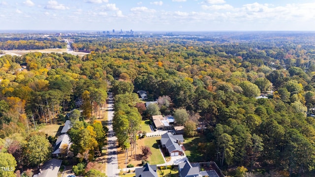 aerial view featuring a forest view