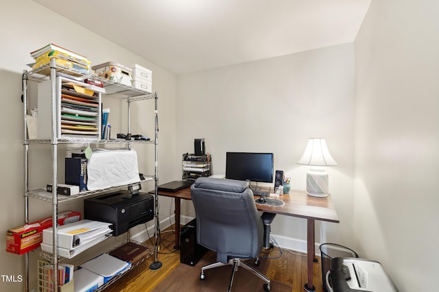 office space featuring dark wood finished floors and baseboards