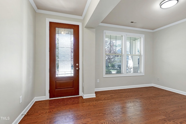 entrance foyer featuring a wealth of natural light, crown molding, and dark hardwood / wood-style flooring