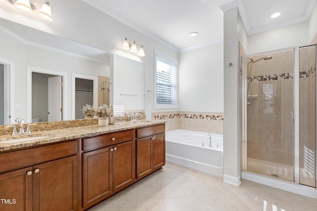 bathroom with ornamental molding, vanity, tile patterned flooring, and independent shower and bath