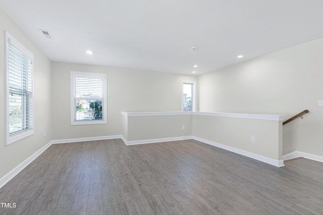 empty room featuring hardwood / wood-style floors