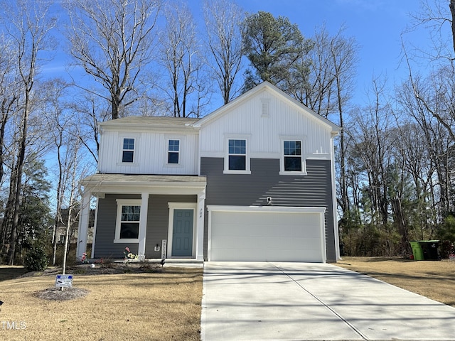 view of front of home with a garage and a porch