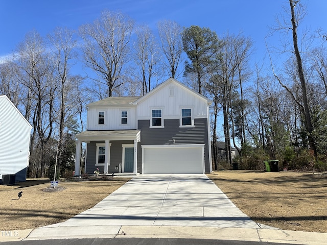 view of front of home featuring a garage and a porch