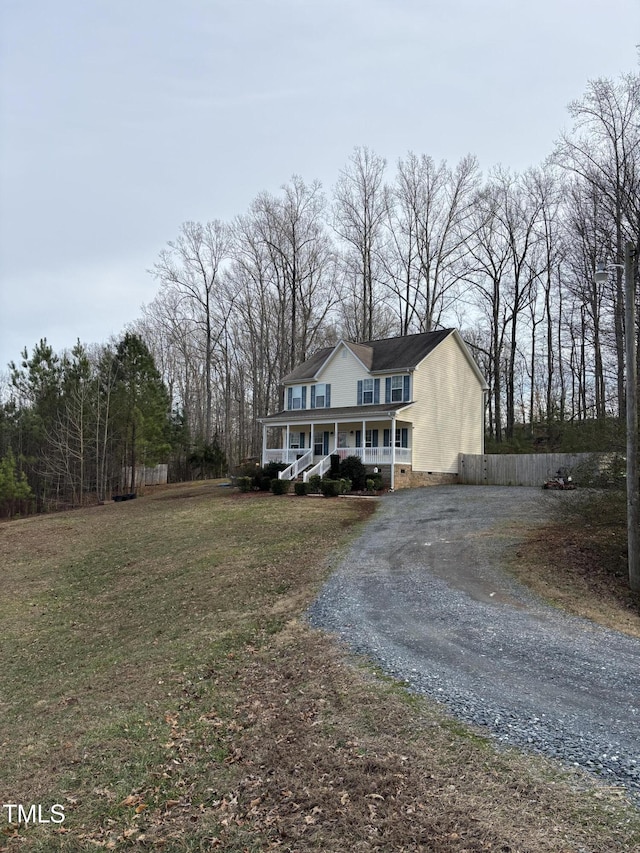 view of front of home with a front lawn and a porch