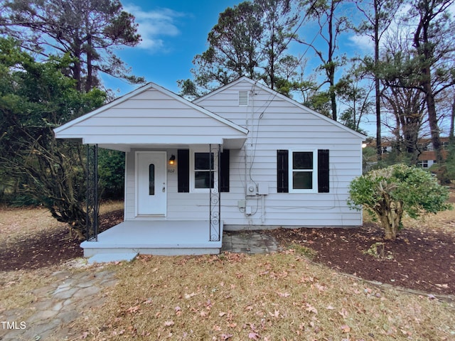 bungalow-style home with covered porch