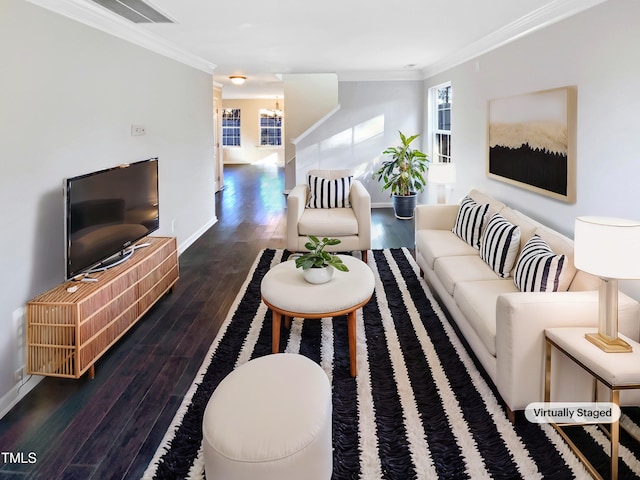 living room with a notable chandelier, dark wood-type flooring, and crown molding