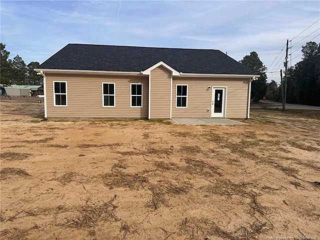 back of property with a patio area