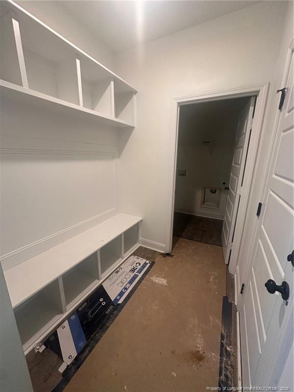 mudroom featuring concrete floors