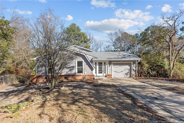 single story home with a garage