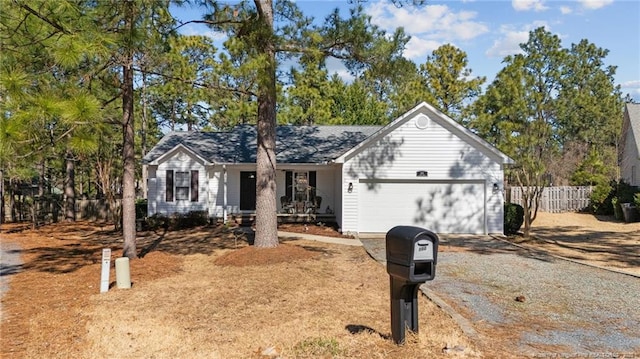 single story home featuring a garage