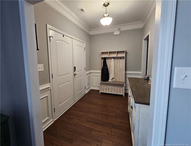 mudroom featuring crown molding and dark hardwood / wood-style flooring