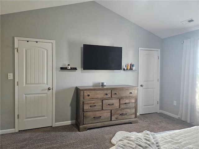 carpeted bedroom featuring vaulted ceiling