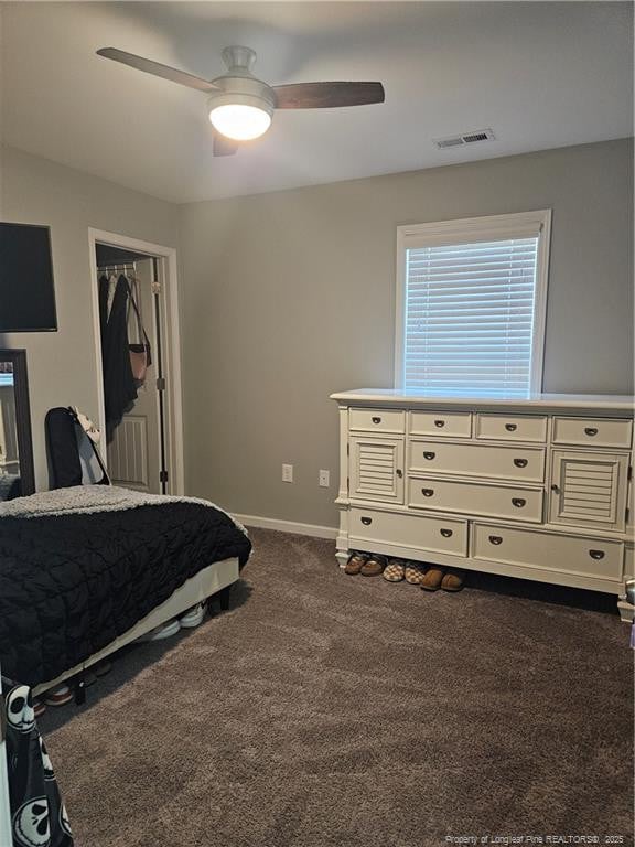 bedroom featuring ceiling fan and carpet floors